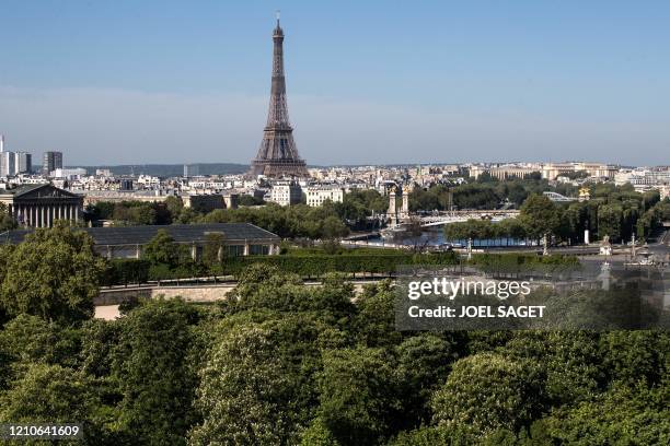 This picture shows the empty Tuileries Gardens and Place de la Concorde, the Palais Bourbon , serving as the French National Assembly, the Eiffel...