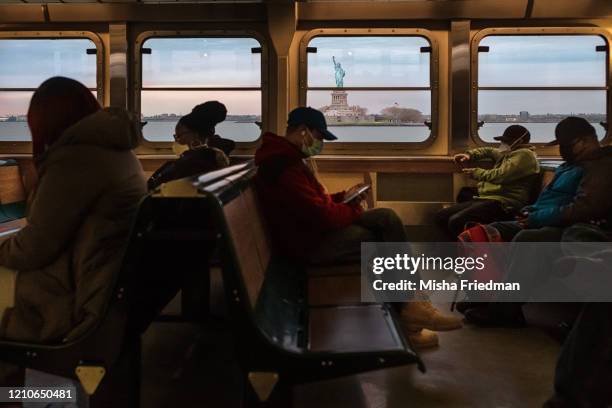Passengers on the Staten Island Ferry on April 14, 2020 in New York City.