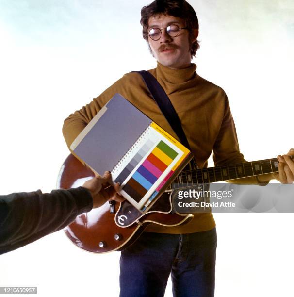 Robbie Robertson of the roots rock group The Band poses for a portrait in 1969 in Saugerties, New York.
