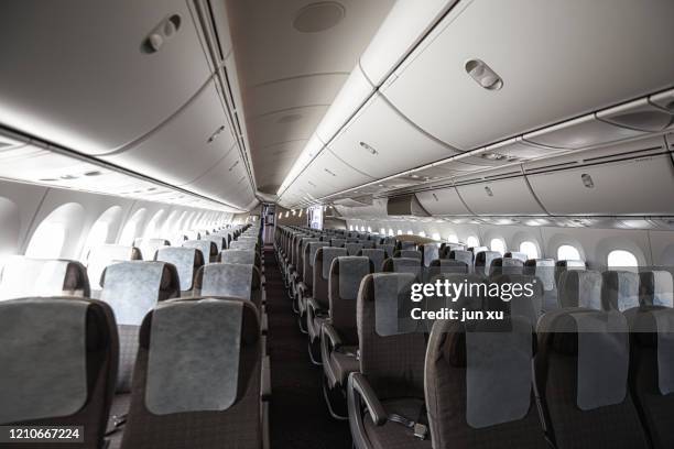 empty seats on large planes - 飛行機の座席 ストックフォトと画像