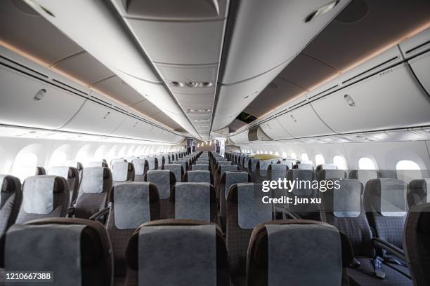 empty seats on large planes - flugzeugsitz stock-fotos und bilder