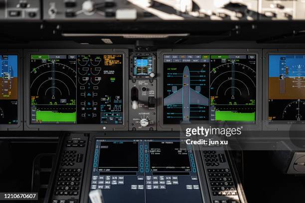 spacious and bright electronic equipment inside the cockpit - radar stock-fotos und bilder