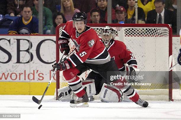 Buffalo Sabres defenseman Toni Lydman skates with the puck in a game against the Florida Panthers during a game at HSBC Arena in Buffalo, New York on...