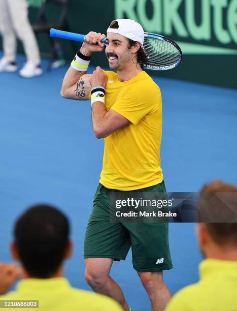 Jordan Thompson of Australia celebrates winning the match during the Davis Cup Qualifier Tie singles match between Jordan Thompson of Australia and...