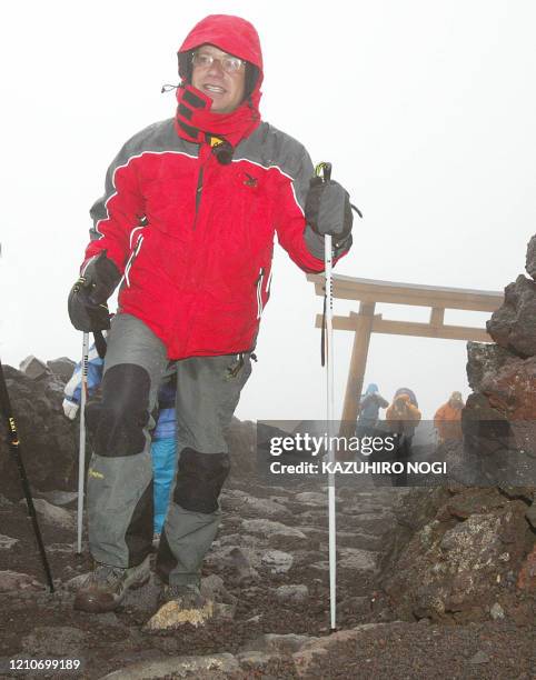Hartwig Gauder, former German Olympic champion, arrives on top of the summit of Mt. Fuji 776-metre , 19 July 2003. Gauder is on a two-day climbing of...