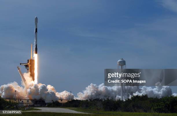 SpaceX Falcon 9 rocket carrying the seventh batch of 60 Starlink satellites successfully launches from pad 39A at the Kennedy Space Center in...