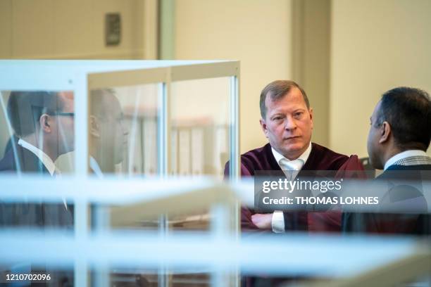 Senior public prosecutor Jasper Klinge is seen at the courtroom prior to the start of a trial against two Syrian defendants accused of...