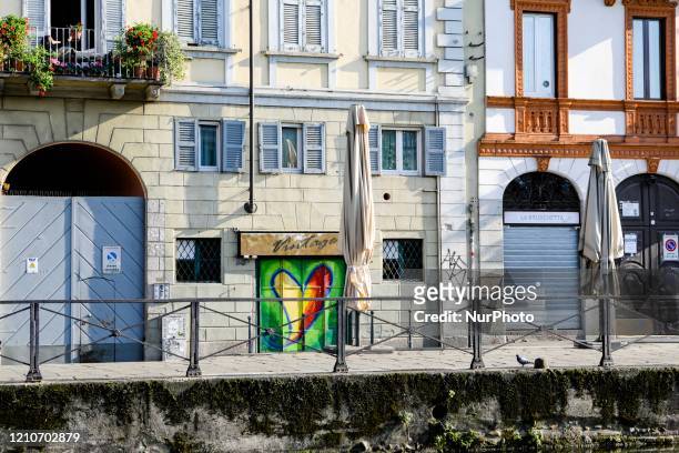 Colored heart is seen on a portcullis in Navigli during the lockdown due to Coronavirus emergency, Milan, April 22 2020