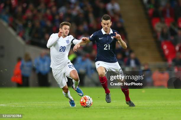 Adam Lallana of England and Laurent Konscielny of France during the International Friendly match between England &amp; France at Wembley Stadium on...