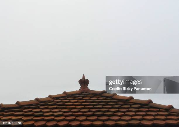 close-up of roof tile against fog - traditional indonesian tile industry imagens e fotografias de stock