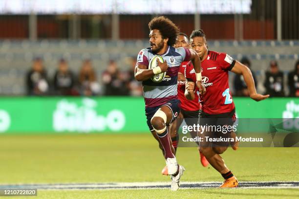 Henry Speight of the Reds makes a break during the round six Super Rugby match between the Crusaders and the Reds at Orangetheory Stadium on March...