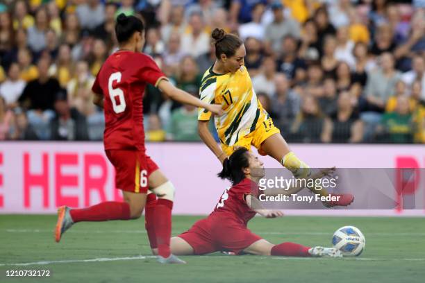 Kyah Simon of the Australian Matildas contests the ball with Pham Thi Tuoi of Vietnam during the Women's Olympic Football Tournament Play-Off match...
