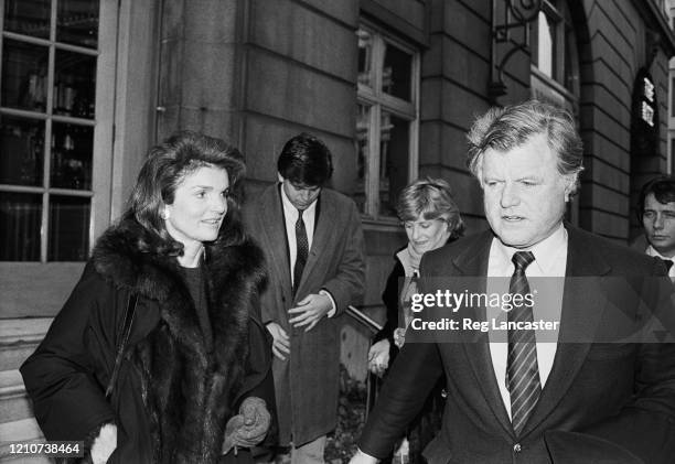 Jacqueline Kennedy Onassis and American politician Ted Kennedy outside The Ritz Hotel in London, England, 1st February 1985. Both were in the country...
