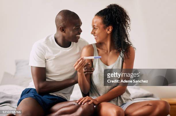 can you believe we're finally gonna be parents? - pregnancy test stock pictures, royalty-free photos & images