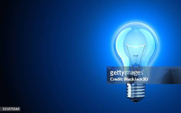 light bulb providing blue light - light bulb stock pictures, royalty-free photos & images