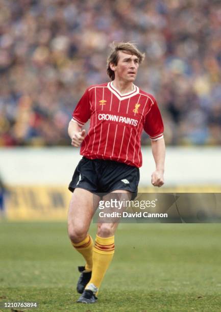 Liverpool player Kenny Dalglish pictured wearing the Liverpool Umbro Home shirt combined with black shorts and Yellow socks for a match at Vicarage...