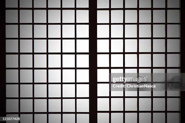 spotlight on shoji (japanese paper screen partition) background - shoji stock pictures, royalty-free photos & images