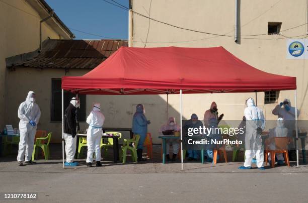 People waiting to get their results from free antibody and COVID-19 testing in the primarily Roma neighborhood of Fakulteta in Sofia, Bulgaria on...