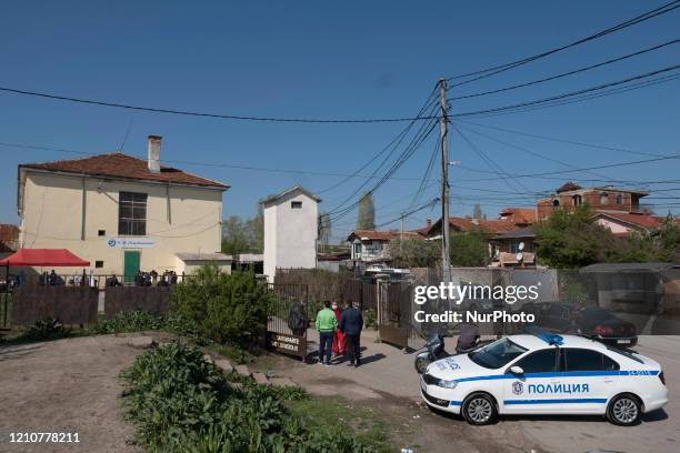 Health workers set up free antibody and COVID-19 testing at the entrance to the primary school in the Roma neighborhood of Fakulteta in Sofia,...