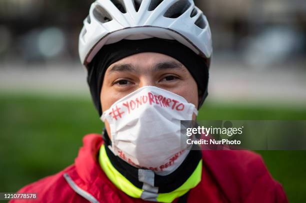 Bicycle delivery workers strike demanding better wages and hygiene materials, gloves, tapabocas and gel alcohol on April 23, 2020 in Buenos Aires,...