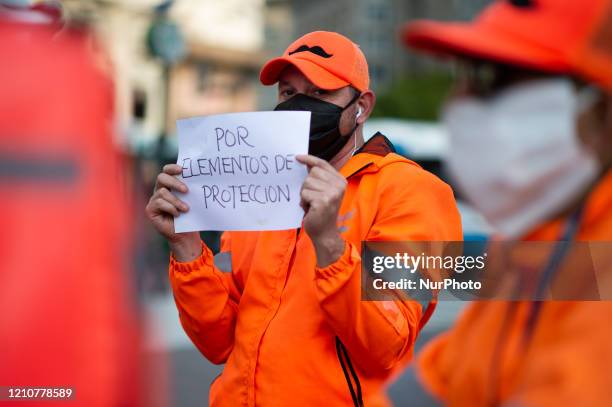 Bicycle delivery workers strike demanding better wages and hygiene materials, gloves, tapabocas and gel alcohol on April 23, 2020 in Buenos Aires,...