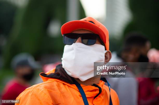 Bicycle delivery workers strike demanding better wages and hygiene materials, gloves, tapabocas and gel alcohol on April 23, 2020 in Buenos Aires,...