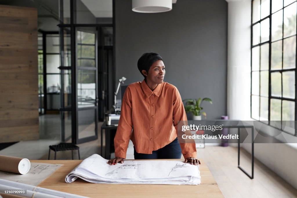 Entrepreneur looking away at workplace