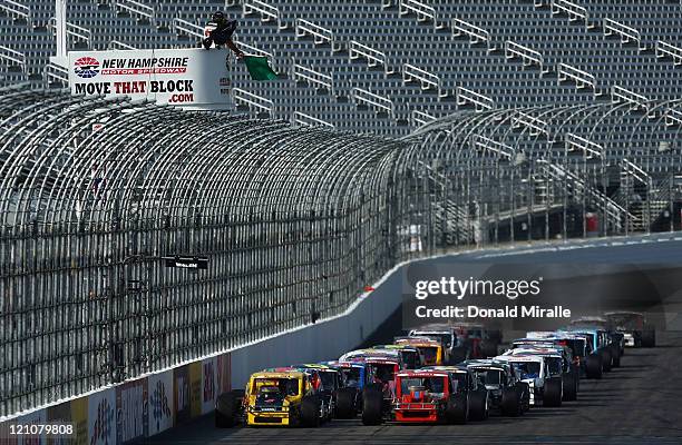 Bobby Santos, driver of the "Mystic Missile" Dodge, leads the pack with Eric Beers, driver of the John Blewett Inc. Chevrolet, at the start during...