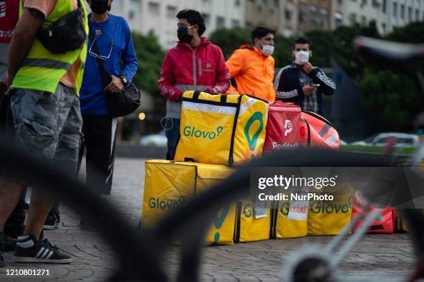 Bicycle delivery workers strike demanding better wages and hygiene materials, gloves, tapabocas and gel alcohol on April 23, 2020 in Buenos Aires,...