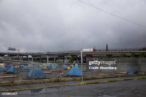 Tents sit at a camp set up for people experiencing homelessness during the coronavirus pandemic in Southeast Portland, Oregon, U.S., on Wednesday,...