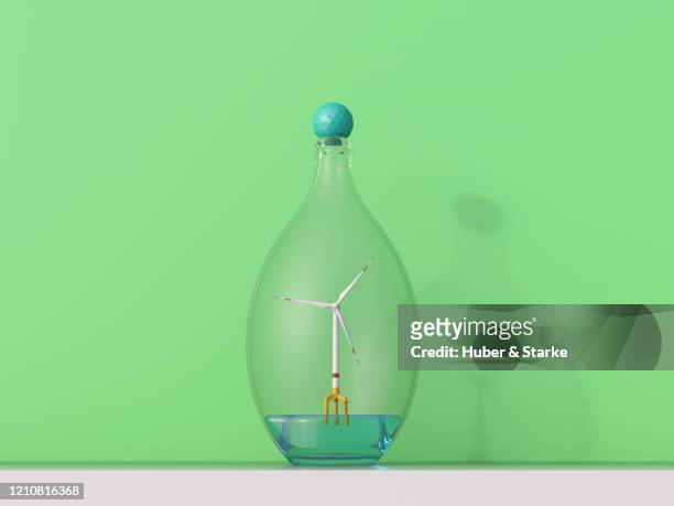 modell of offshore wind turbine in glas bottle