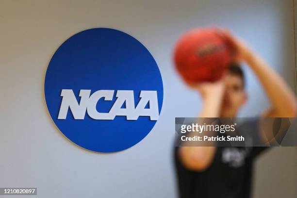 Logo is seen on the wall as Yeshiva players warmup prior to playing against Worcester Polytechnic Institute during the NCAA Division III Men's...