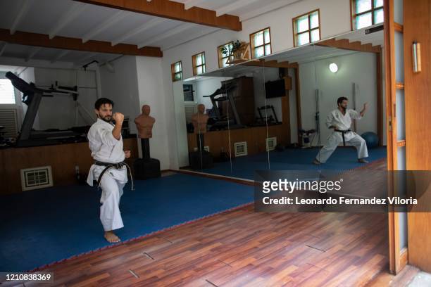 Venezuelan Karateka Antonio Jose Diaz Fernandez performs his Kata training in his Dojo during COVID-19 lockdown on April 22, 2020 in Caracas,...