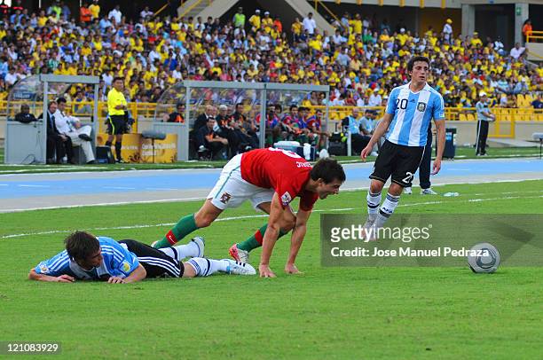Cedric, form Portugal, fighst for the ball with Nicolas Tagliafico, from Argentina, during the match between Argentina and Portugal as part of the...
