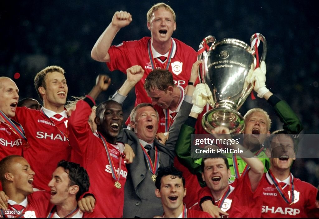 The Manchester United team celebrate with the European Cup