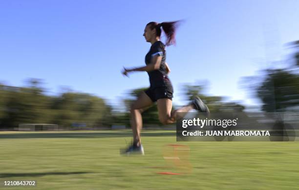 Argentine football player Mara Gomez trains with her first division women's football team, Villa San Carlos, in La Plata, Argentina, on February 14,...