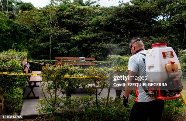 Worker fumigates against the Aedes aegypti --the mosquito that can spread dengue fever-- in San Jose, on April 22, 2020. - Central America faces a...