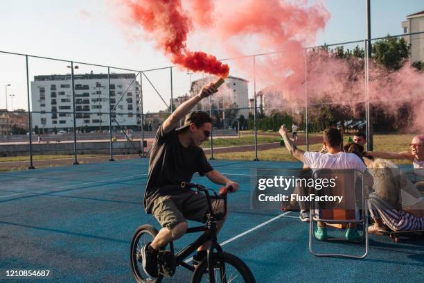 modern hooligan - smoke bomb stock pictures, royalty-free photos & images