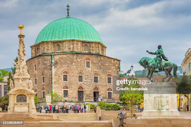 downtown pecs hungary mosque of pasha qasim - pecs hungary stock pictures, royalty-free photos & images