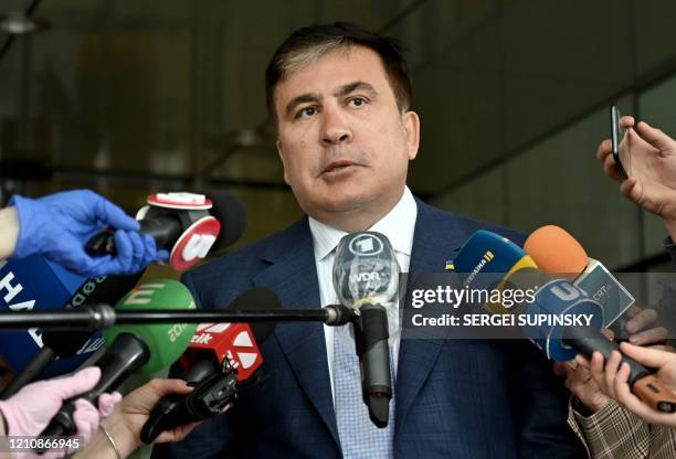 Mikheil Saakashvili talks to the media after his meeting with Ukrainian President Volodymyr Zelensky's "Servant of the People" ruling party members...