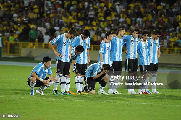 Argentine players lament after loosing in the penalty shoot out the match between Argentina and Portugal as part of the U20 World Cup Colombia 2011...