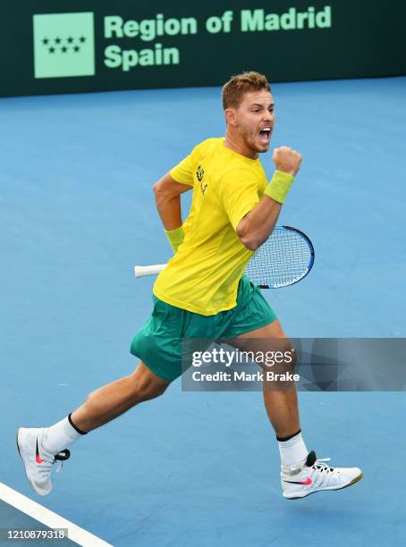 James Duckworth of Australia celebrates winning first the set during the Davis Cup Qualifier doubles match between James Duckworth of Australia and...
