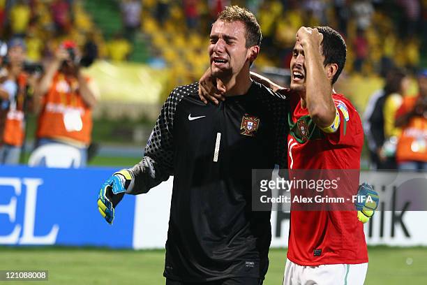 Goalkeeper Mika and Nuno Reis of Portugal celebrate after the penalty shoot-out at the FIFA U-20 World Cup 2011 quarter final match between Portugal...
