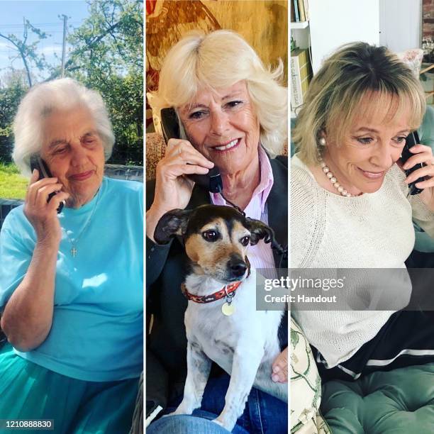 In this digital composite handout image provided by Clarence House, Camilla Duchess of Cornwall speaks to Silver Line user Betty and the helpline's...