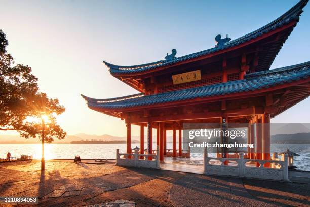 hangzhou west lake winter cuiguang pavilion - red beacon stock pictures, royalty-free photos & images