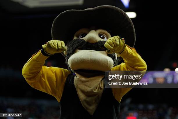 Wyoming Cowboys mascot Pistol Pete cheers on his team against the Utah State Aggies during a semifinal game of the Mountain West Conference...