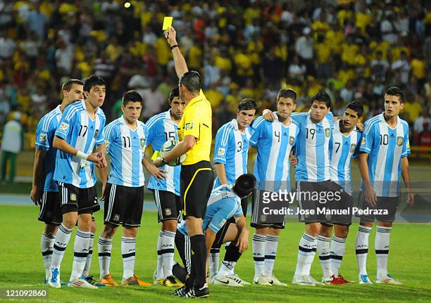 Rodrigo Battaglia from Argentina receives the yellor card in the penalty shoot out the match between Argentina and Portugal as part of the U20 World...