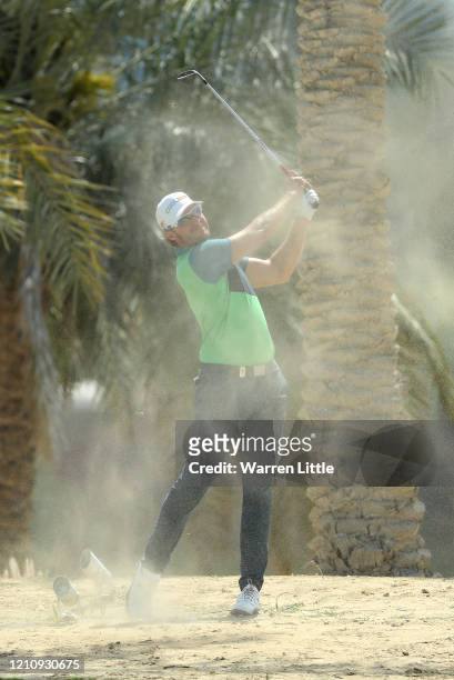 Kalle Samooja of Finland plays out of the sand on the third hole during the third round of the Commercial Bank Qatar Masters at Education City Golf...