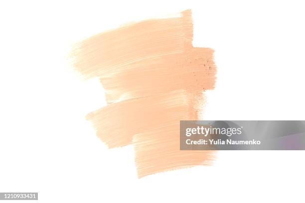 bronze makeup smear isolated on white background. liquid foundation makeup texture. foundation strokes or liquid powder on a white background. - cosmetic texture photos et images de collection