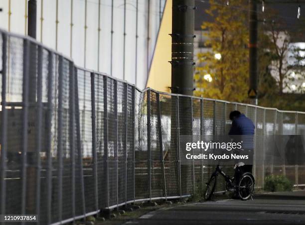 Man prays at the site of a massive 2005 train derailment in Amagasaki, western Japan, on April 24 the eve of its 15th anniversary. A rush-hour...